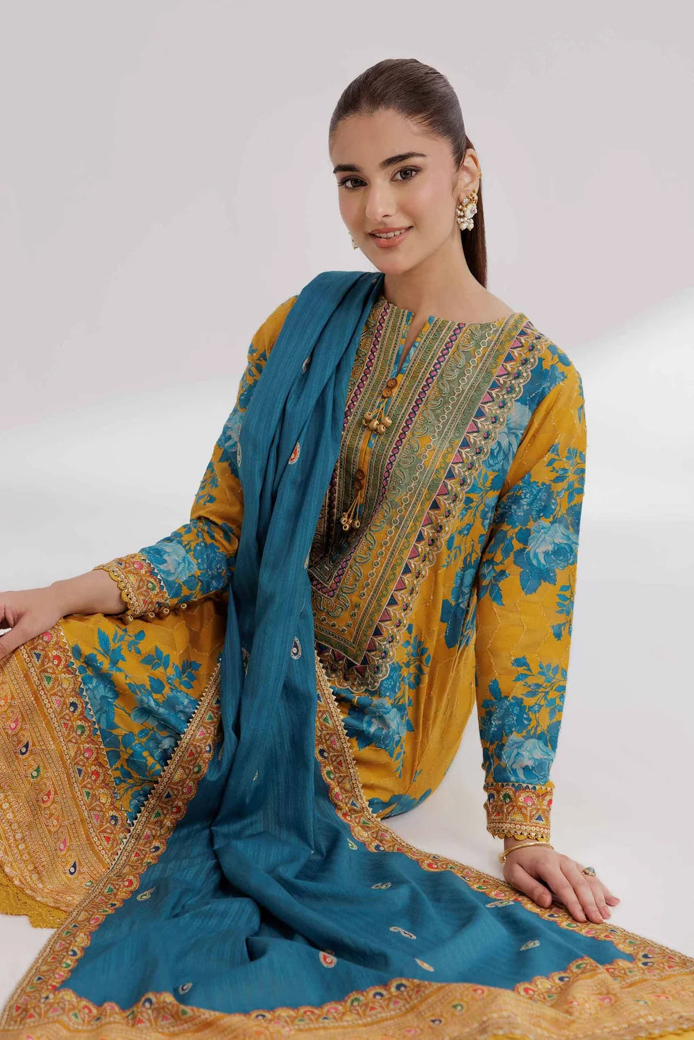 Nishat Linen 3-Piece Digital Printed Embroidered Suit – Mustard Yellow & Teal Blue