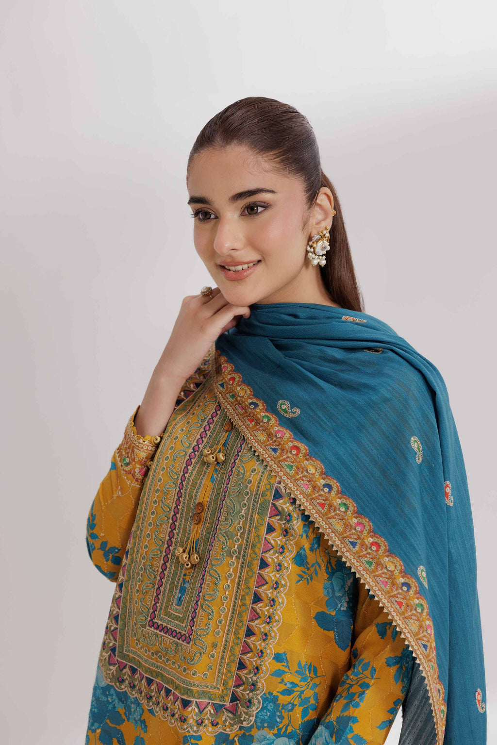 Nishat Linen 3-Piece Digital Printed Embroidered Suit – Mustard Yellow & Teal Blue